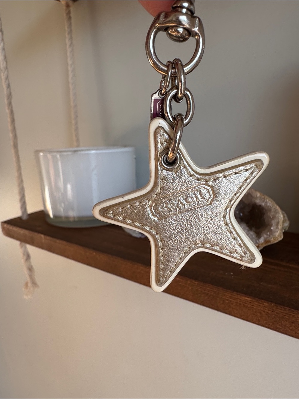 Coach Metallic Gold Star keychain with Cream Edge